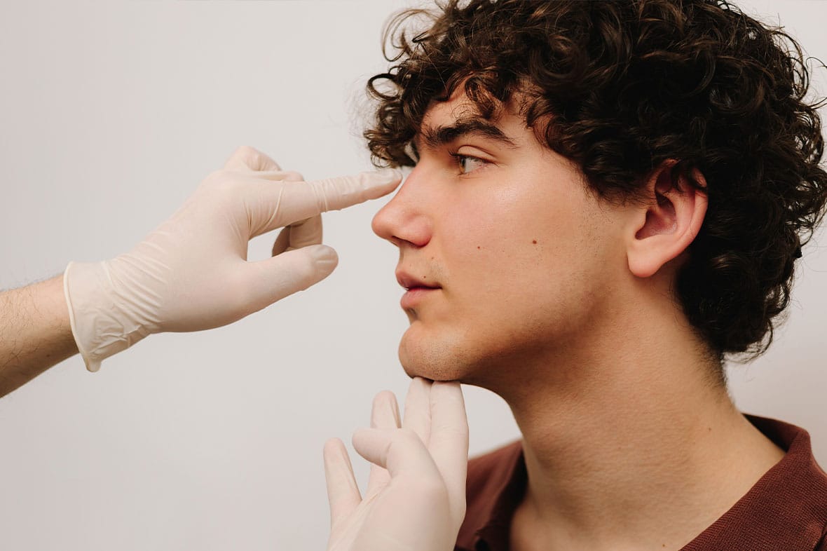 man getting a rhinoplasty consultation in NYC
