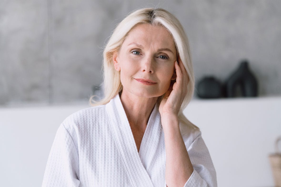 older woman after getting a revision facelift in NYC